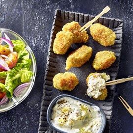 Buchcover „Airfryer Blitzrezepte“ mit Autor Christian Henze und Fotos knuspriger Gerichte.