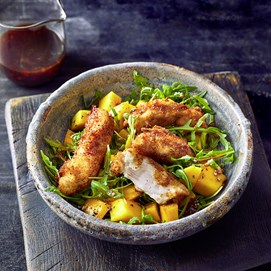 Buchcover „Airfryer Blitzrezepte“ mit Autor Christian Henze und Fotos knuspriger Gerichte.