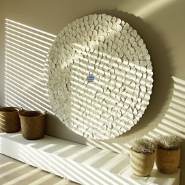 Buchcover „Craftwerk“ mit DIY-Deko aus Naturmaterialien, Bildern von Bastelprojekten und Porträt von Gabriele Chomrak.